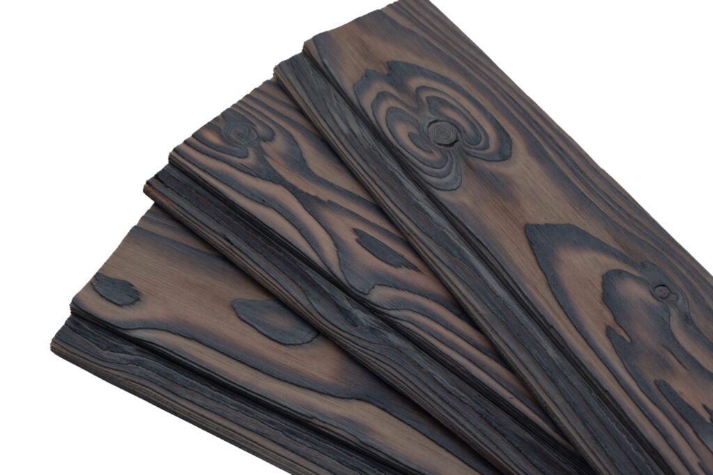 charred larch cladding medeksa sand
