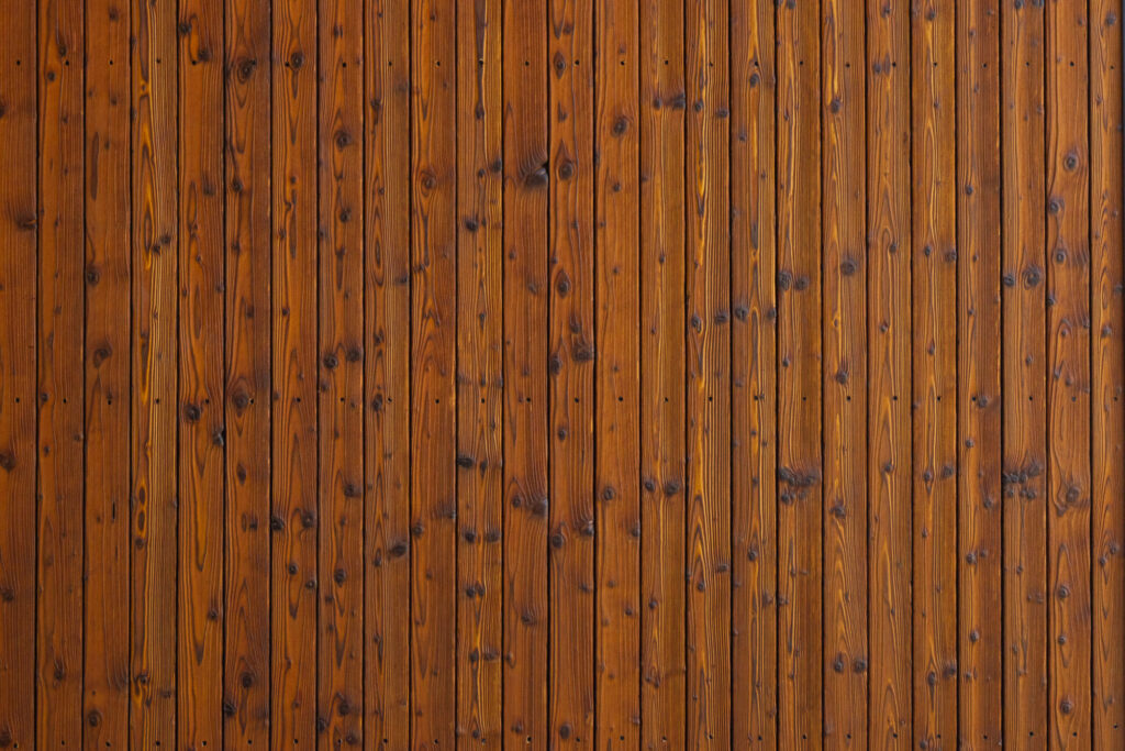 Charred wood siding for facades – a close-up view of the texture and grain of charred wood